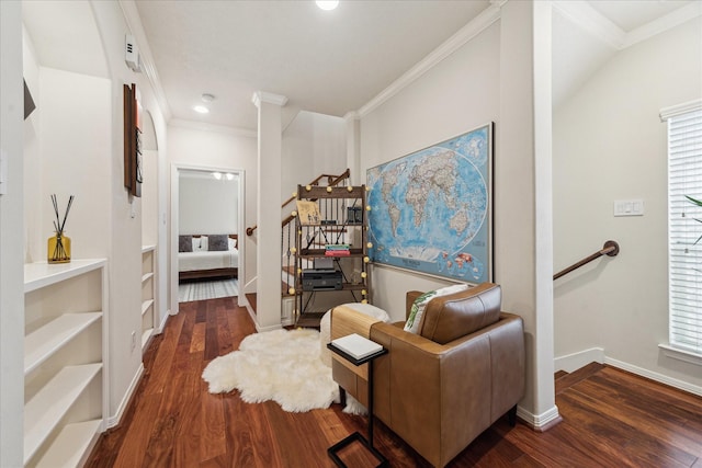 14402 Basalt Ln, Houston, TX 77077 - living area with wood finished floors, crown molding, stairway, baseboards, and recessed lighting