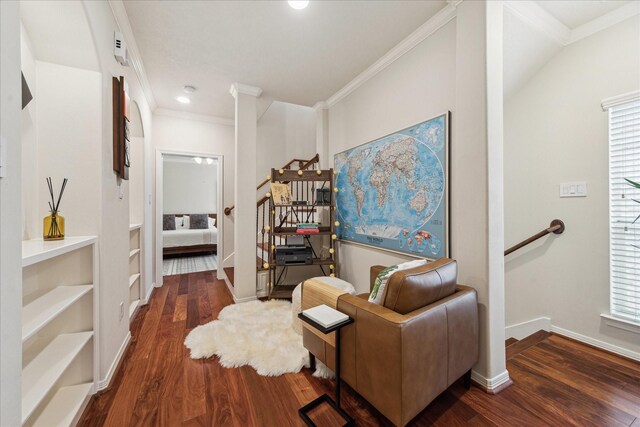 14402 Basalt Ln, Houston, TX 77077 - living area featuring wood finished floors, crown molding, stairway, baseboards, and recessed lighting