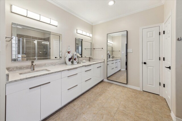 14402 Basalt Ln, Houston, TX 77077 - full bathroom featuring crown molding, a shower stall, double vanity, tile patterned flooring, and recessed lighting