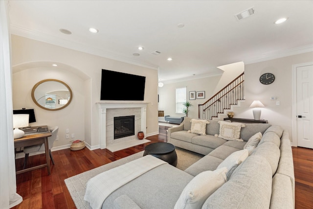 14402 Basalt Ln, Houston, TX 77077 - living room with ornamental molding, recessed lighting, wood finished floors, a premium fireplace, and stairs