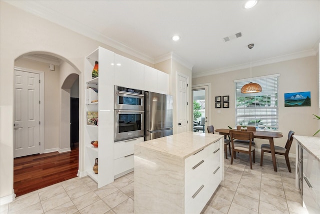 14402 Basalt Ln, Houston, TX 77077 - kitchen featuring open shelves, appliances with stainless steel finishes, modern cabinets, crown molding, and white cabinetry
