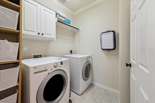 14402 Basalt Ln, Houston, TX 77077 - laundry room with independent washer and dryer, crown molding, cabinet space, baseboards, and light tile patterned flooring