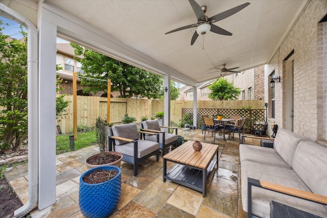 14402 Basalt Ln, Houston, TX 77077 - fenced backyard with an outdoor hangout area, outdoor dining space, and a patio area