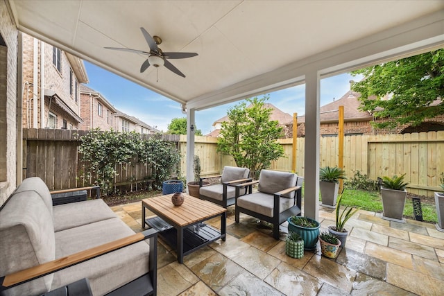14402 Basalt Ln, Houston, TX 77077 - fenced backyard featuring an outdoor hangout area, a patio, and ceiling fan