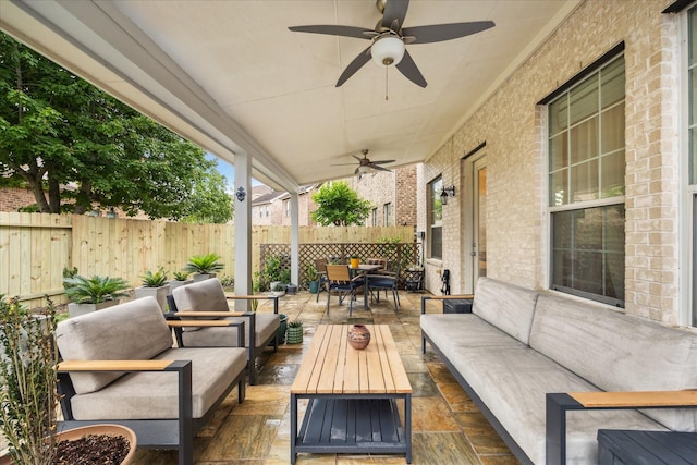 14402 Basalt Ln, Houston, TX 77077 - fenced backyard featuring an outdoor living space, ceiling fan, and a patio area