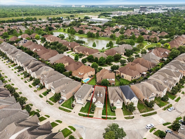 14402 Basalt Ln, Houston, TX 77077 - aerial perspective of suburban area featuring a large body of water and property parcel outlined