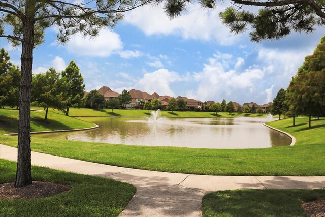 14402 Basalt Ln, Houston, TX 77077 - view of home's community with a water view, a lawn, and a residential view