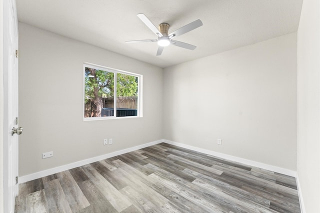 4434 Falcon Meadow Dr, Katy, TX 77449 - unfurnished room with a ceiling fan, wood finished floors, and baseboards
