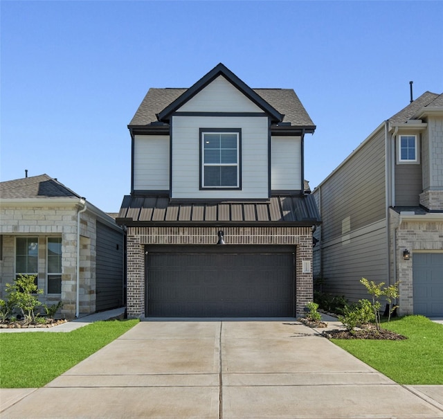 21106 Garden Palm Dr, Cypress, TX 77433 - view of front facade featuring brick siding, a garage, driveway, and roof with shingles