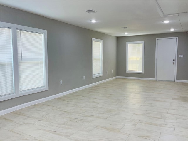 506 N Hackberry St, Sweeny, TX 77480 - spare room featuring recessed lighting, baseboards, and attic access
