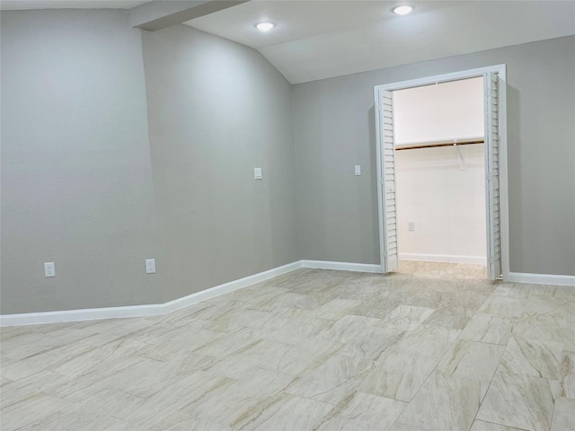 506 N Hackberry St, Sweeny, TX 77480 - unfurnished bedroom with lofted ceiling, a walk in closet, recessed lighting, baseboards, and a closet
