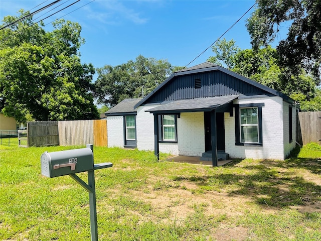 506 N Hackberry St, Sweeny, TX 77480 - bungalow-style house with brick siding and roof with shingles