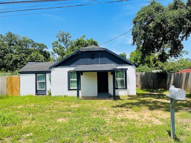 506 N Hackberry St, Sweeny, TX 77480 - bungalow-style home featuring brick siding and a shingled roof