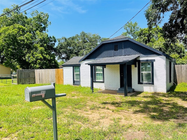 506 N Hackberry St, Sweeny, TX 77480 - bungalow with brick siding and a shingled roof
