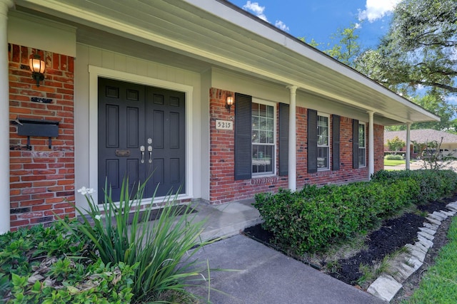 5215 Stillbrooke Dr, Houston, TX 77035 - entrance to property with brick siding and a porch