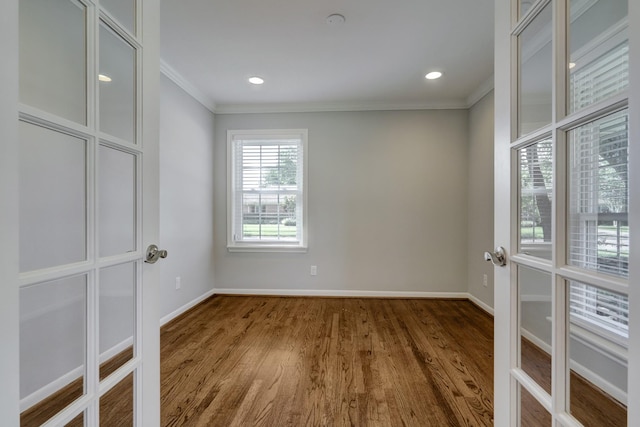 5215 Stillbrooke Dr, Houston, TX 77035 - unfurnished room featuring ornamental molding, wood finished floors, baseboards, and french doors