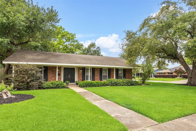 5215 Stillbrooke Dr, Houston, TX 77035 - single story home with a front lawn and brick siding