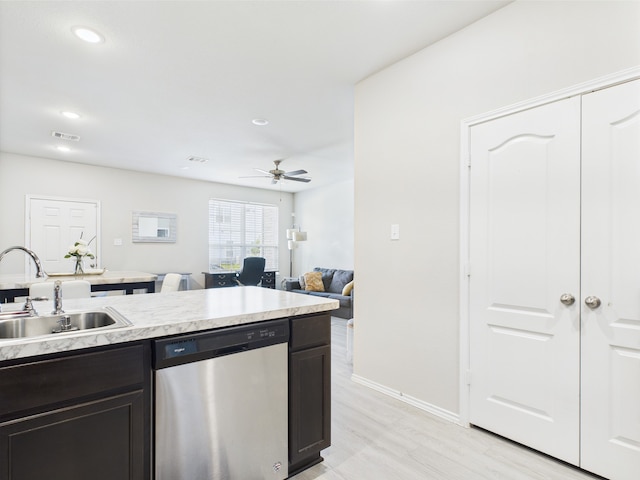 12671 Taymouth Manor Dr Unit 6, Humble, TX 77346 - kitchen with stainless steel dishwasher, a ceiling fan, a sink, light wood-style flooring, and recessed lighting