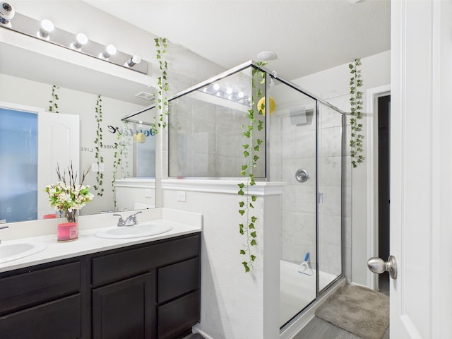 12671 Taymouth Manor Dr Unit 6, Humble, TX 77346 - full bath with a shower stall and double vanity