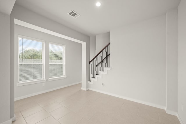 2906 Park Hill Ln, Stafford, TX 77477 - foyer entrance with baseboards, stairs, light tile patterned floors, and recessed lighting