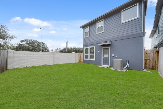 2906 Park Hill Ln, Stafford, TX 77477 - rear view of property with central AC and stucco siding