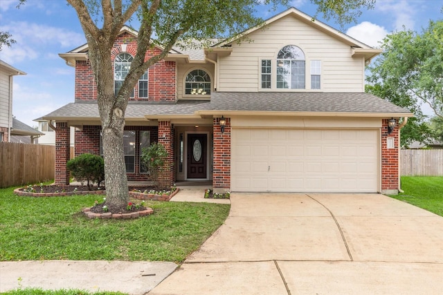 1056 Inverness Cv, Dickinson, TX 77539 - traditional home featuring brick siding, an attached garage, and driveway