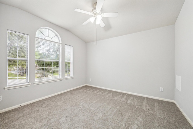 1056 Inverness Cv, Dickinson, TX 77539 - empty room with carpet, lofted ceiling, a ceiling fan, and baseboards