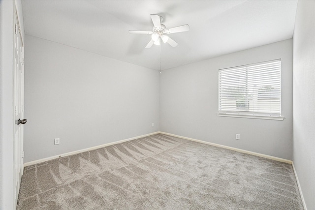 1056 Inverness Cv, Dickinson, TX 77539 - carpeted spare room featuring a ceiling fan and baseboards