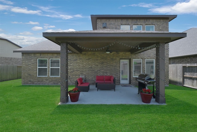 6323 Grand Summit Ct, Katy, TX 77494 - back of house with brick siding, ceiling fan, a patio, and outdoor lounge area