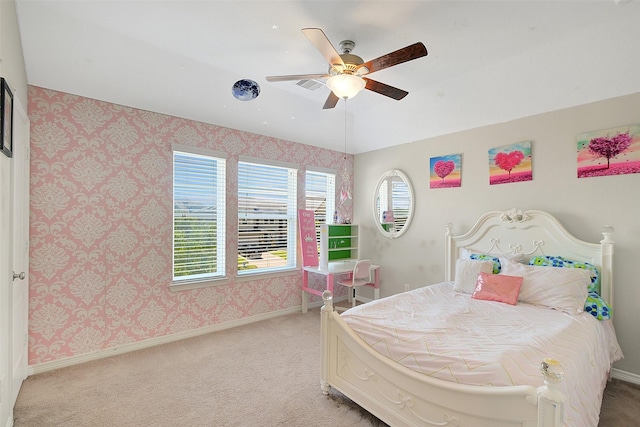 6323 Grand Summit Ct, Katy, TX 77494 - bedroom with wallpapered walls, light carpet, baseboards, and a ceiling fan