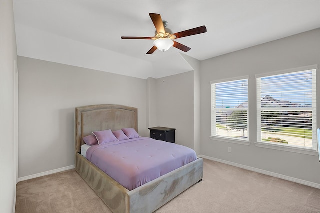 6323 Grand Summit Ct, Katy, TX 77494 - bedroom featuring light colored carpet, baseboards, and a ceiling fan