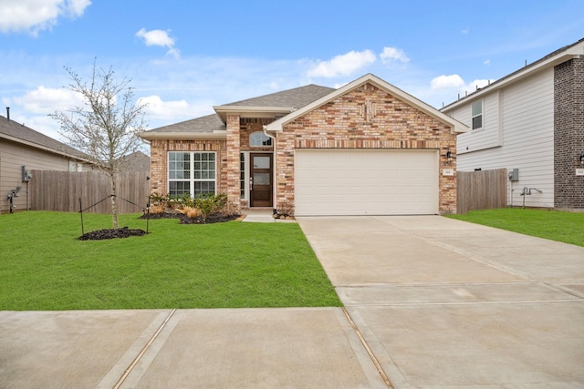 666 Cherry Tree Dr, La Marque, TX 77568 - view of front of home featuring brick siding, an attached garage, concrete driveway, and a shingled roof