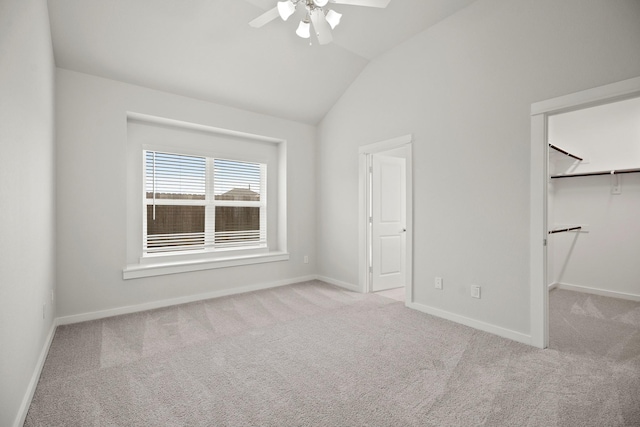 666 Cherry Tree Dr, La Marque, TX 77568 - unfurnished bedroom with carpet floors, lofted ceiling, baseboards, and a spacious closet