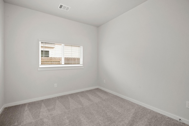 666 Cherry Tree Dr, La Marque, TX 77568 - carpeted spare room featuring baseboards