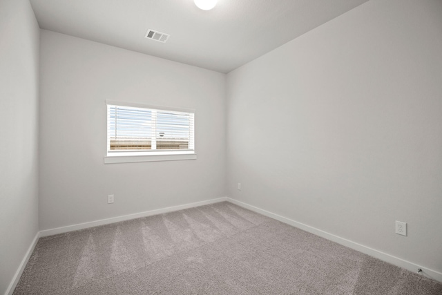 666 Cherry Tree Dr, La Marque, TX 77568 - carpeted spare room featuring baseboards
