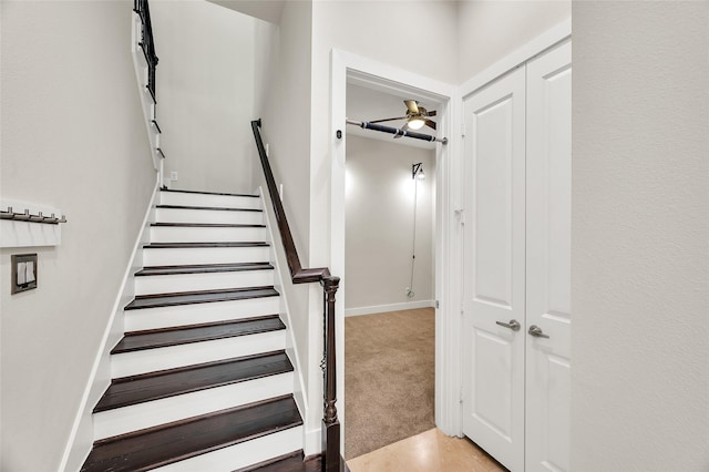 34 N Hutcheson St, Houston, TX 77003 - stairway with a ceiling fan, carpet, and baseboards
