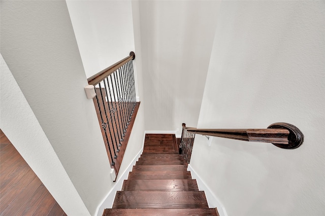 34 N Hutcheson St, Houston, TX 77003 - staircase featuring wood finished floors and baseboards
