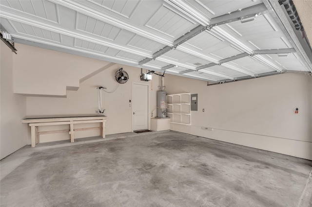 34 N Hutcheson St, Houston, TX 77003 - garage with gas water heater, electric panel, and a garage door opener