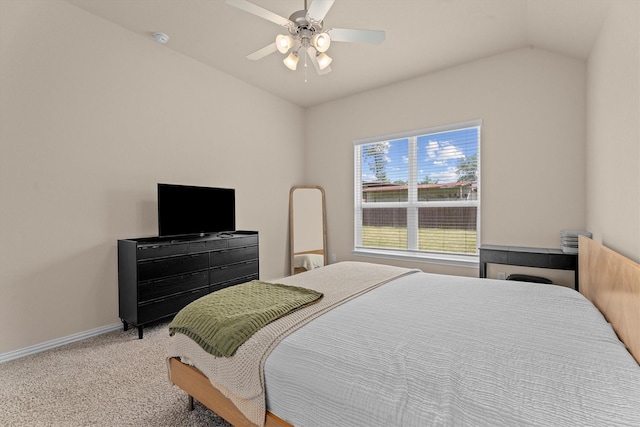 635 W Linnwood Dr, Woodbranch, TX 77357 - carpeted bedroom with vaulted ceiling, baseboards, and ceiling fan