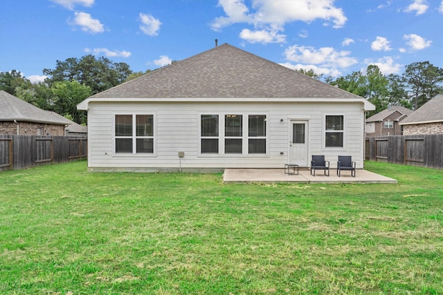 635 W Linnwood Dr, Woodbranch, TX 77357 - back of property featuring a patio and a shingled roof
