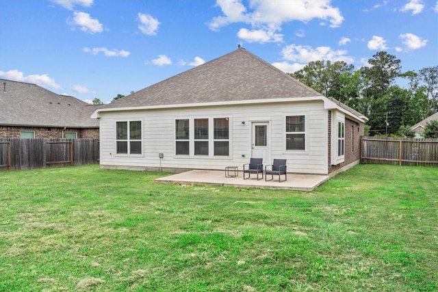 635 W Linnwood Dr, Woodbranch, TX 77357 - rear view of house featuring a patio area and a shingled roof