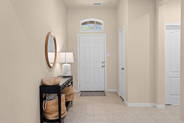 635 W Linnwood Dr, Woodbranch, TX 77357 - foyer entrance featuring light tile patterned floors and baseboards