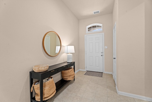 635 W Linnwood Dr, Woodbranch, TX 77357 - entryway with baseboards and light tile patterned flooring