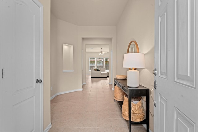 635 W Linnwood Dr, Woodbranch, TX 77357 - corridor featuring light tile patterned flooring and baseboards