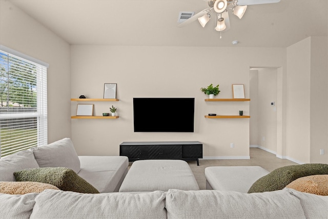 635 W Linnwood Dr, Woodbranch, TX 77357 - living room featuring ceiling fan, baseboards, and carpet flooring