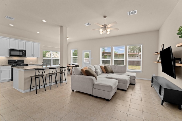 635 W Linnwood Dr, Woodbranch, TX 77357 - living area with light tile patterned floors, a ceiling fan, recessed lighting, and baseboards
