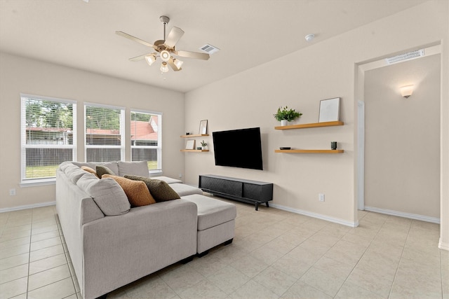 635 W Linnwood Dr, Woodbranch, TX 77357 - living area with a ceiling fan, baseboards, and light tile patterned flooring
