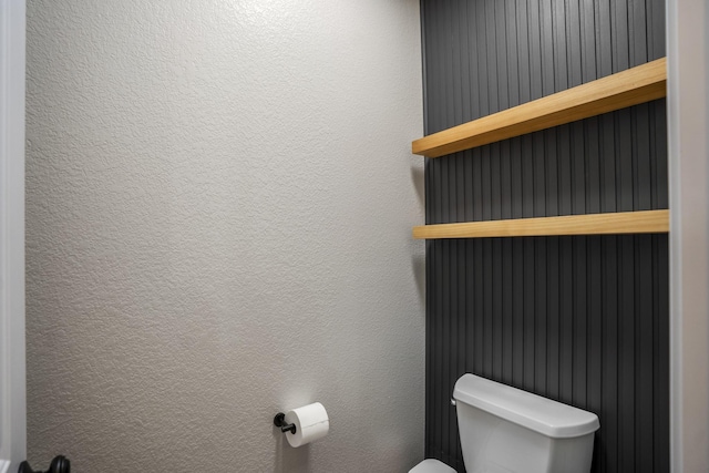 123 Clearmont Pl, Montgomery, TX 77316 - bathroom featuring toilet and a textured wall