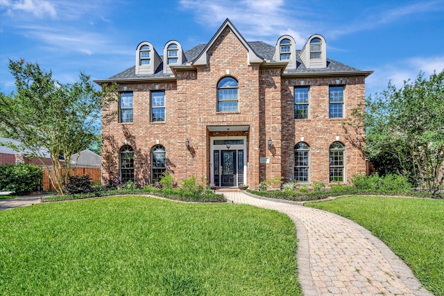 colonial home with brick siding