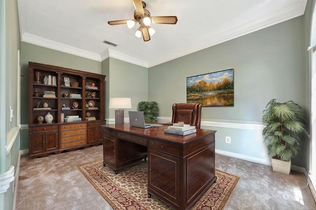 office space featuring a ceiling fan, ornamental molding, and baseboards